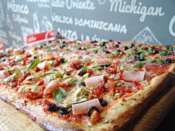 Pizza Rústica: famosas pizzas por rebanada que enloquecerán tu paladar