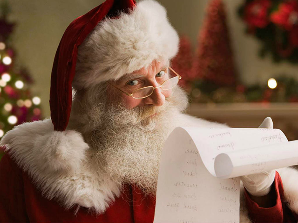 Fantasía Navideña Santa leyendo