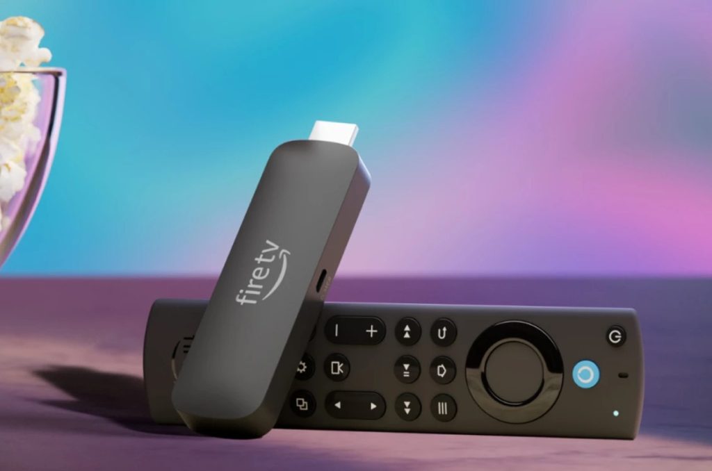 Fire TV Stick 4K Max (segunda generación) sobre un fondo multicolor. 